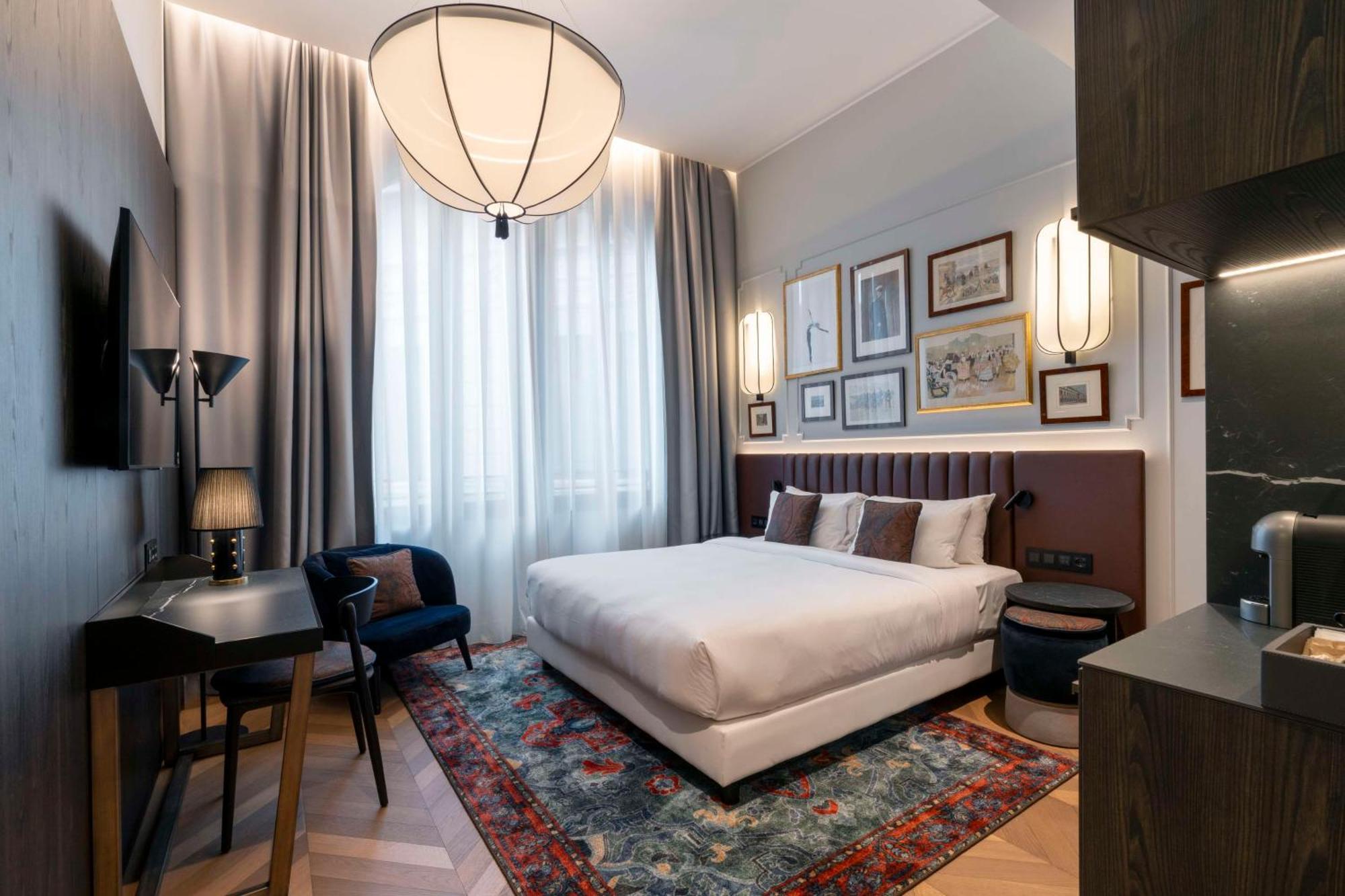 Radisson Collection Hotel, Palazzo Touring Club Milaan Buitenkant foto A room at the hotel